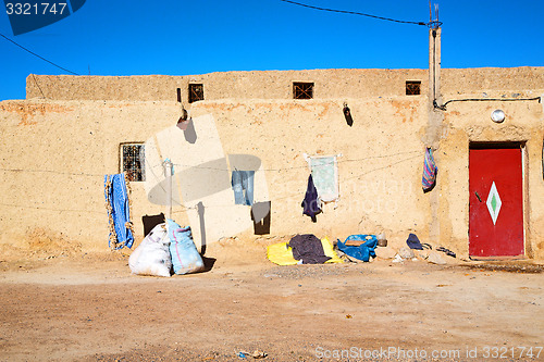 Image of bags  roof  moroccan old wall  