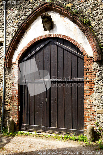 Image of europe  italy  lombardy        the milano old   church  grass   