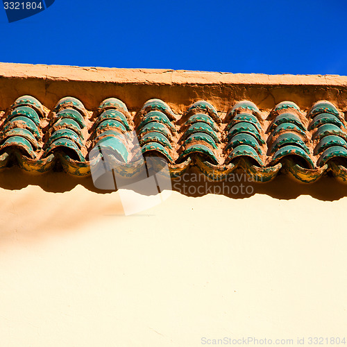 Image of tile roof  moroccan old wall and brick in antique city