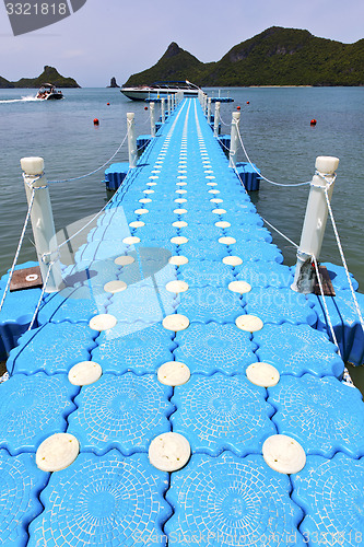 Image of plastic pier  of a  green lagoon and   kho phangan   bay  