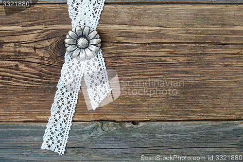 Image of vintage metal buttons flowers and lace tape