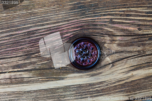 Image of one vintage leather button