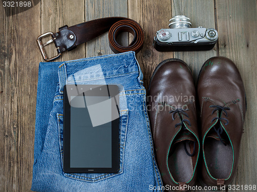 Image of traveler set with a digitizer, leather belt, rangefinder camera,