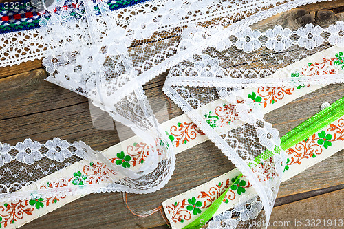 Image of vintage ribbons, tape and lace