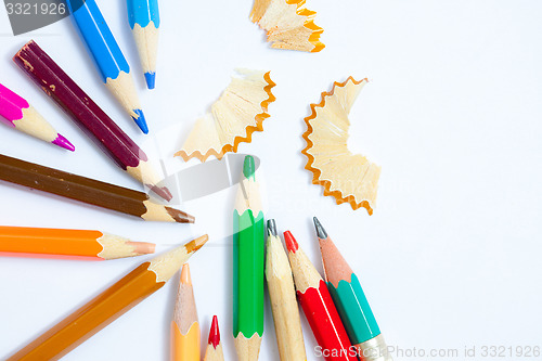 Image of pencils and shavings on white background with copy space, close 