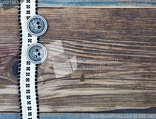 Image of Vintage band with embroidered pattern and ancient classical butt