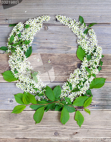Image of wreath of bird-cherry blossom branches