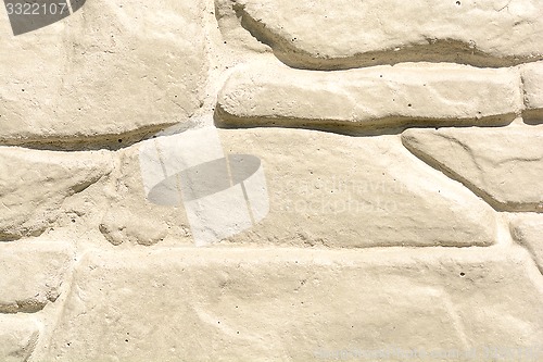 Image of Elegant stone wall from small square parts