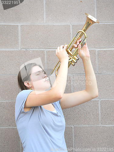 Image of Female trumpet player.