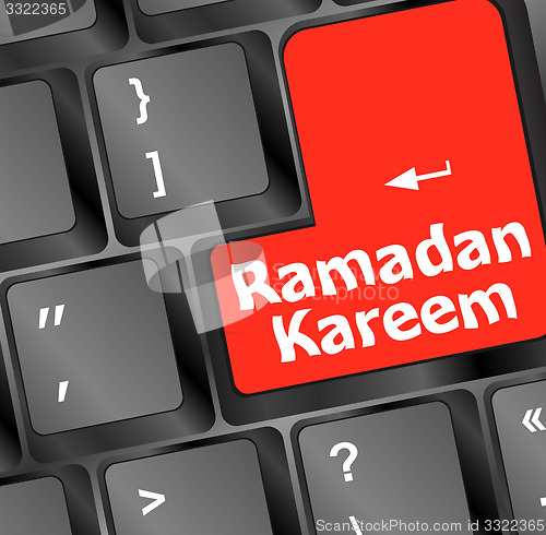 Image of Computer keyboard with ramadan kareem word on it