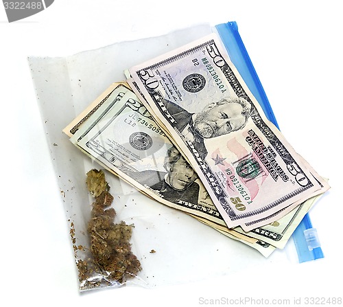 Image of money and baggie of pot