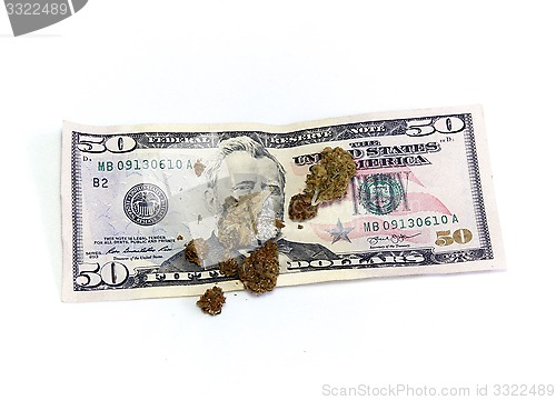 Image of money and marijuana