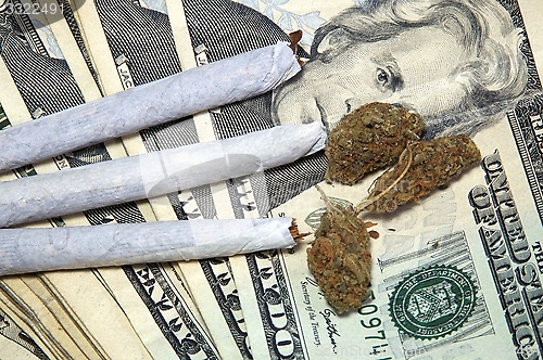 Image of pot and money up close