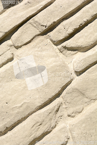 Image of Elegant stone wall from small square parts