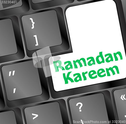 Image of Computer keyboard with ramadan kareem word on it