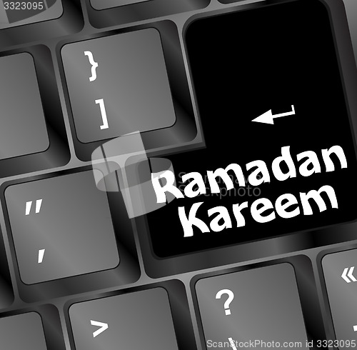 Image of Computer keyboard with ramadan kareem word on it