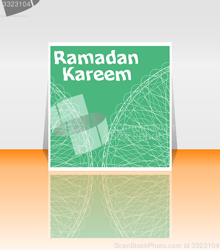 Image of Arabic Islamic calligraphy of text Ramadan Kareem on abstract background