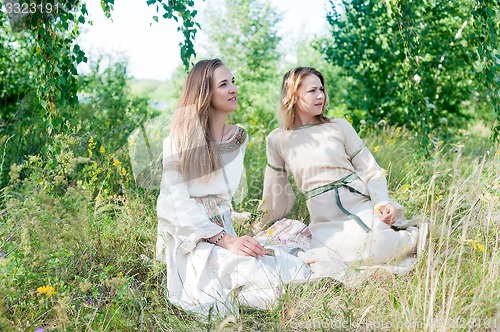 Image of Beautiful women relaxing on nature