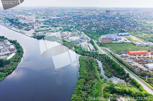 Image of Communist street along Tura river. Tyumen. Russia