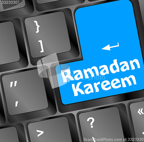 Image of Computer keyboard with ramadan kareem word on it