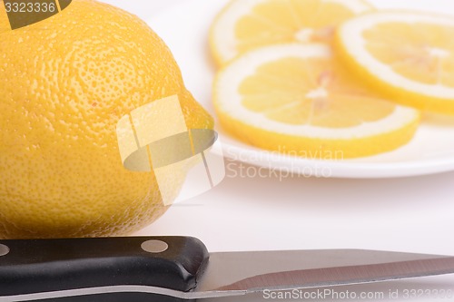 Image of Fresh lemon and knife