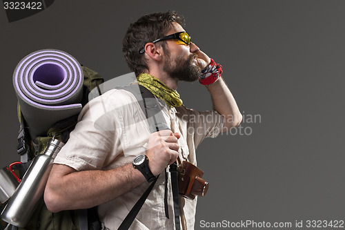 Image of Portrait of a male fully equipped tourist 