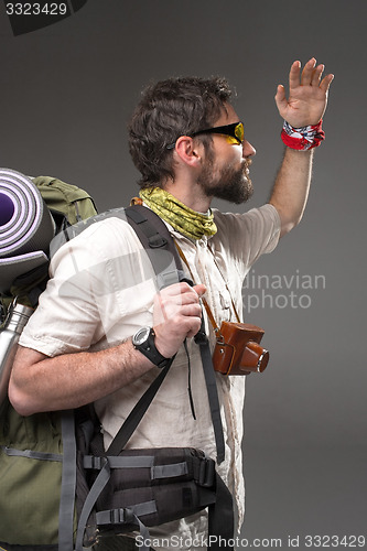 Image of Portrait of a male fully equipped tourist 