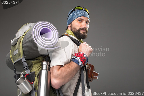 Image of Portrait of a male fully equipped tourist 