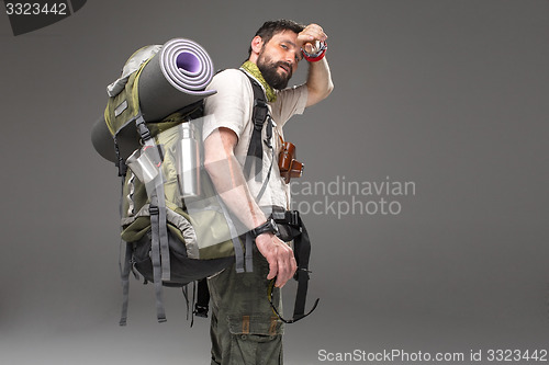 Image of Portrait of a male fully equipped tourist 