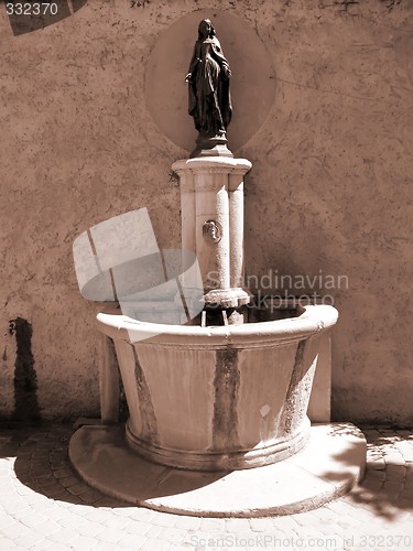 Image of old fountain in a provence village