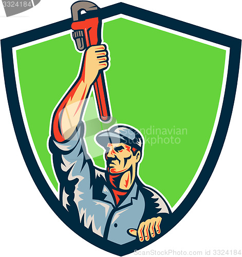 Image of Plumber Raising Up Monkey Wrench Shield Retro