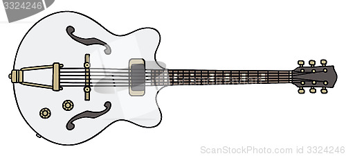 Image of Old white electric guitar