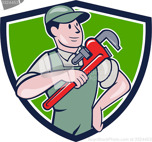 Image of Plumber Pointing Monkey Wrench Shield Cartoon