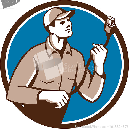 Image of Worker Holding HDMI Plug Cord Circle Retro