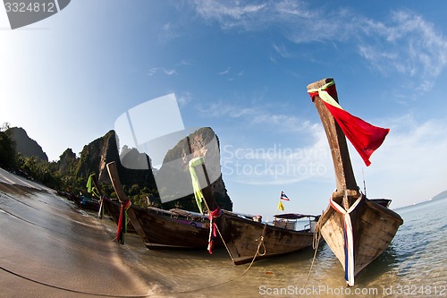 Image of Several Long tail boat  at the beach in Railay Beach Thailand