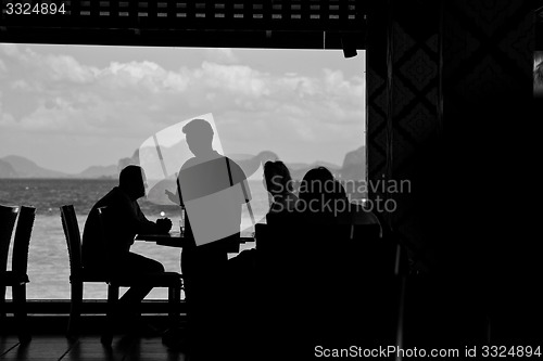 Image of Silhouette of people eating 