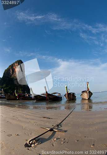 Image of Several Long tail boat  at the beach in Railay Beach Thailand