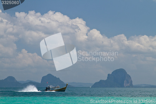 Image of Tourists on a boat  in thailand