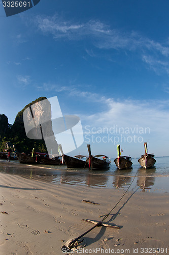 Image of Several Long tail boat  at the beach in Railay Beach Thailand