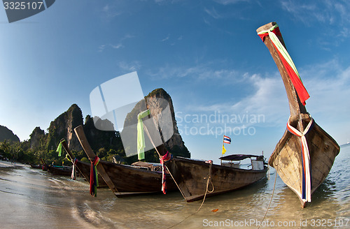 Image of Several Long tail boat  at the beach in Railay Beach Thailand