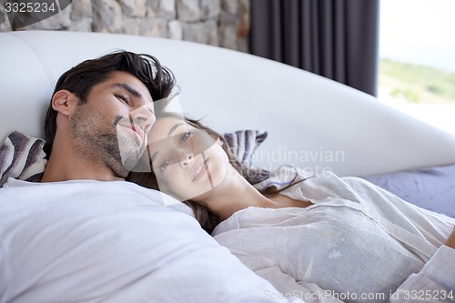 Image of couple relax and have fun in bed