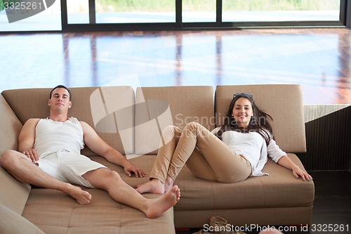 Image of happy young romantic couple have fun arelax  relax at home