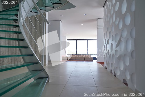 Image of modern glass spiral staircase