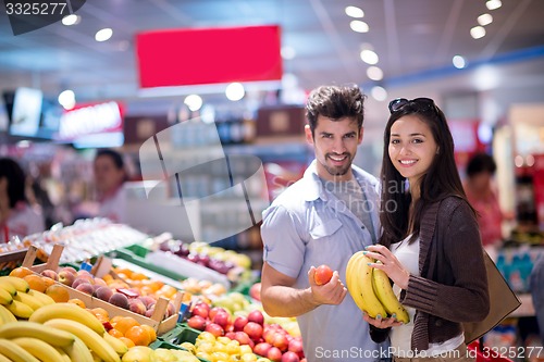 Image of couple shopping in a supermarket