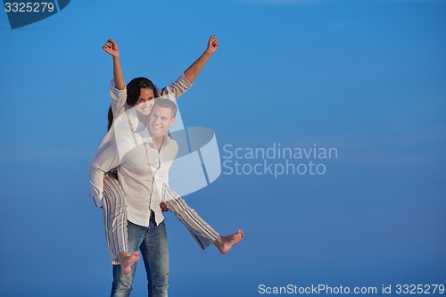 Image of happy young romantic couple have fun arelax  relax at home