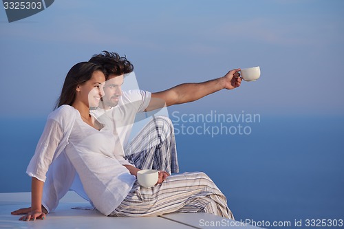 Image of happy young romantic couple have fun arelax  relax at home