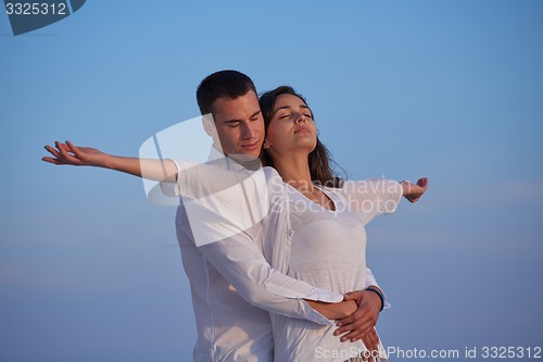 Image of happy young romantic couple have fun arelax  relax at home