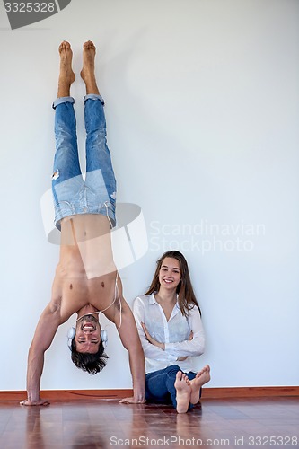 Image of happy young romantic couple have fun arelax  relax at home