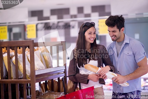 Image of couple shopping in a supermarket