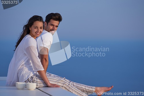 Image of happy young romantic couple have fun arelax  relax at home